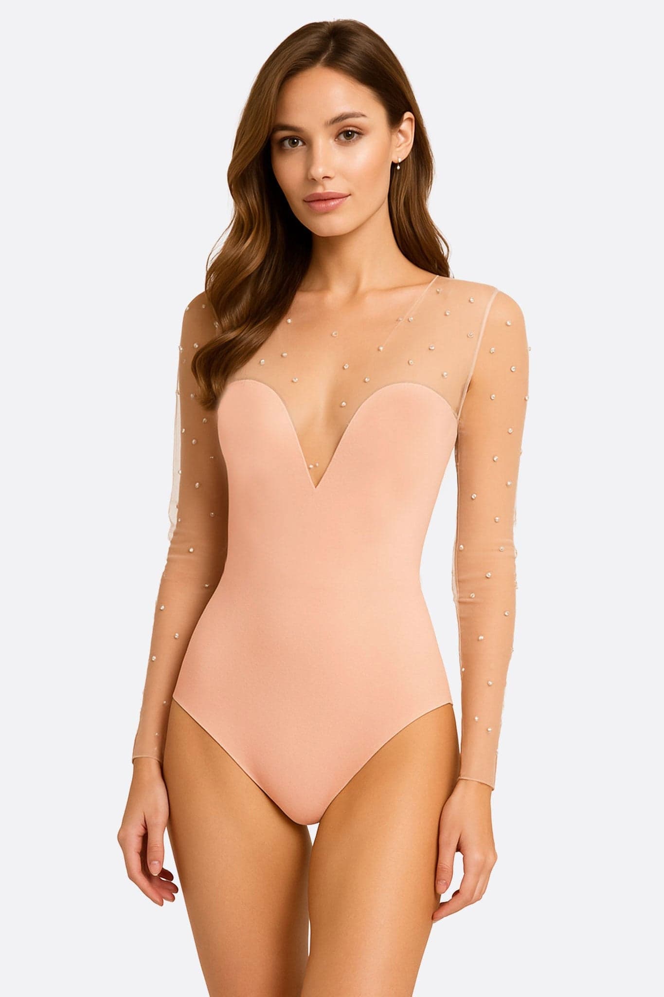 Nude tulle body adorned with pearls, highlighting an elegant and feminine silhouette