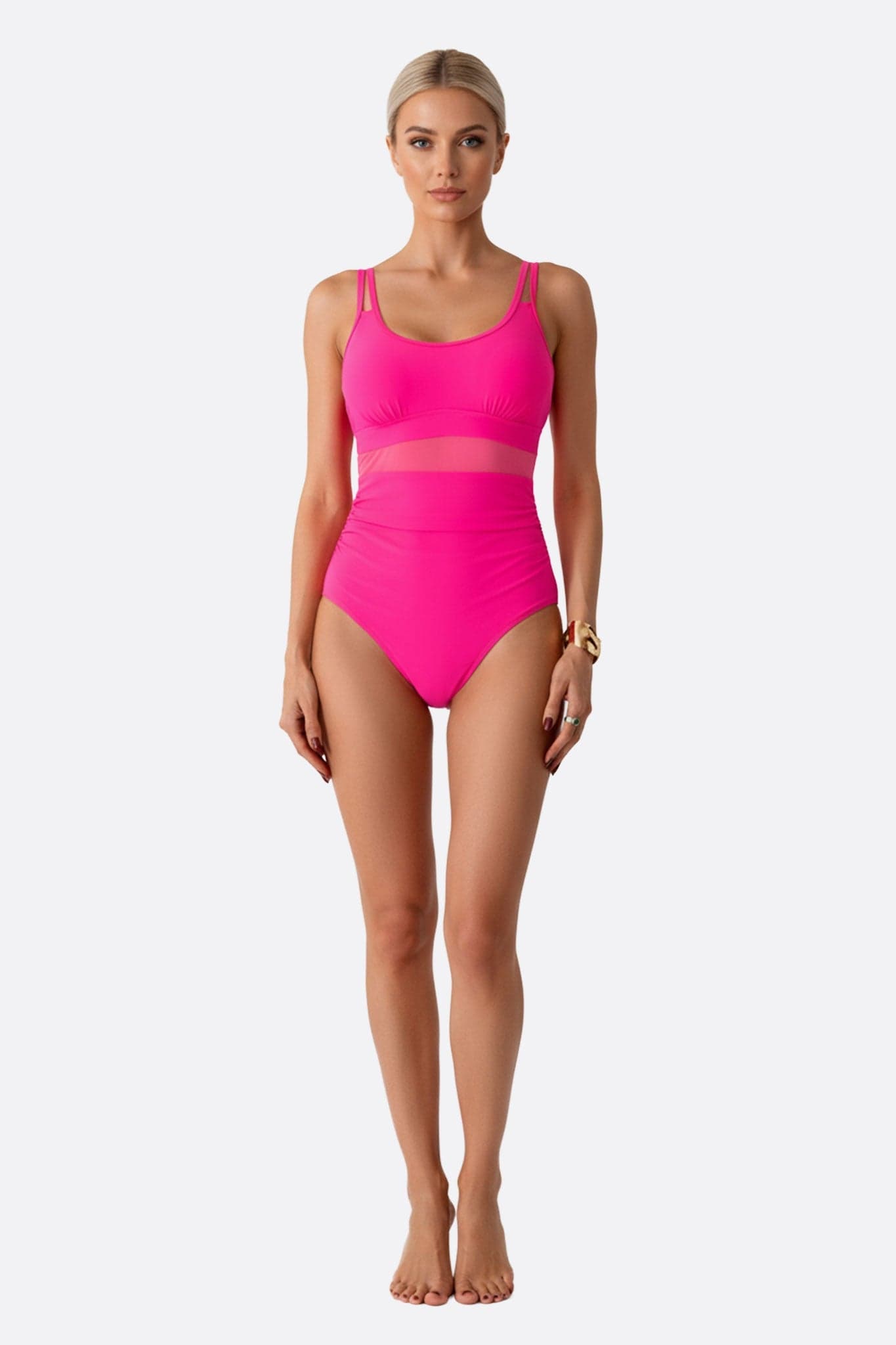 Maillot de bain une pièce en rose fuchsia, chic et élégant, avec résille pour des journées estivales à la plage.