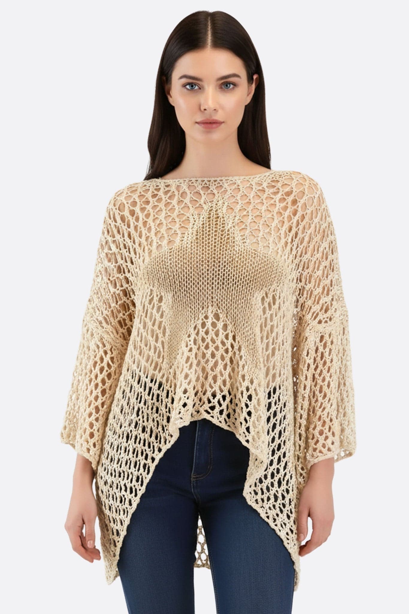 Poncho élégant beige en maille ajourée avec motif étoilé, parfait pour un style bohème chic au quotidien.
