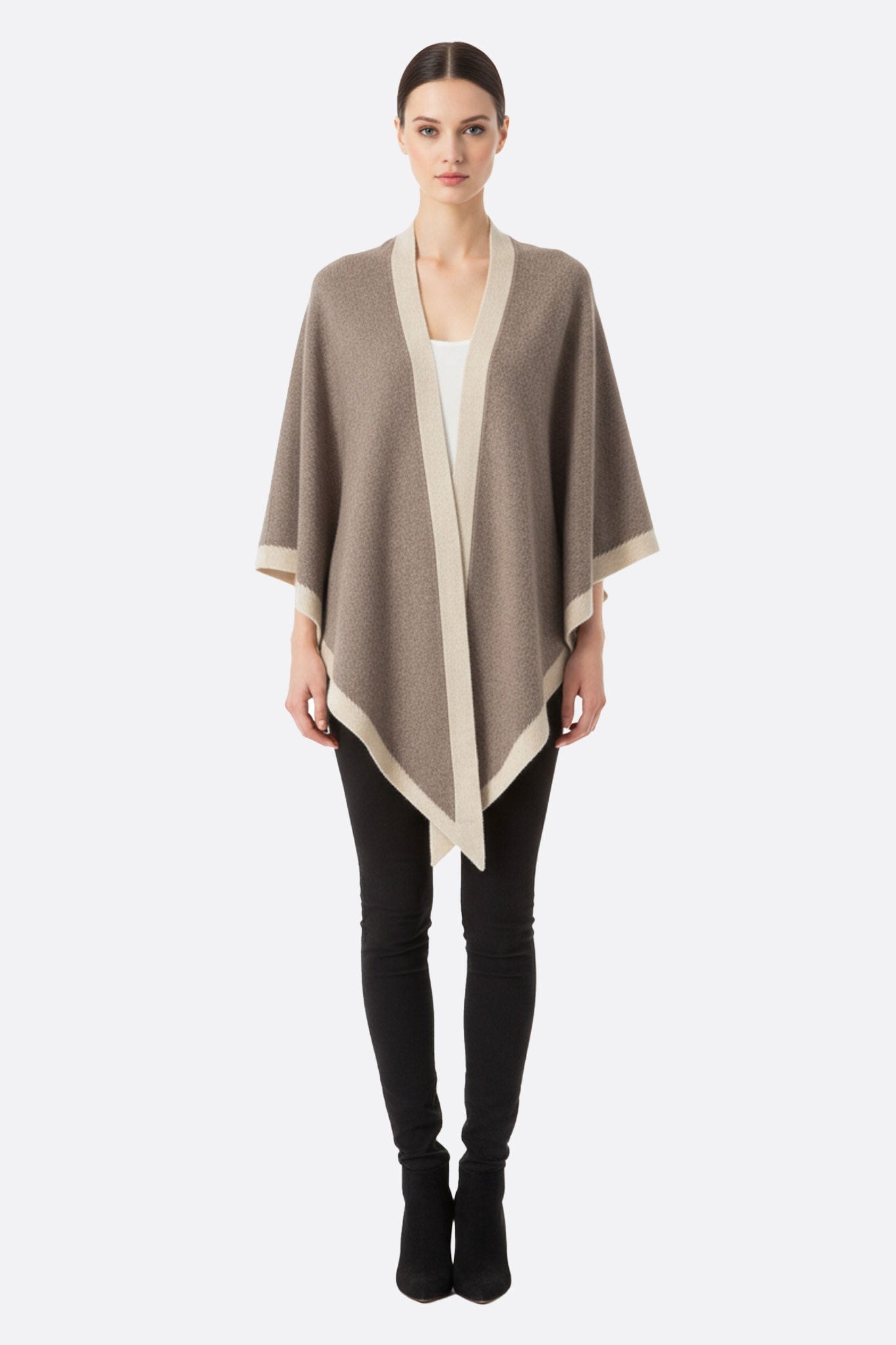 Taupe cashmere poncho with contrasting beige bands, essential accessory for a refined look at...
