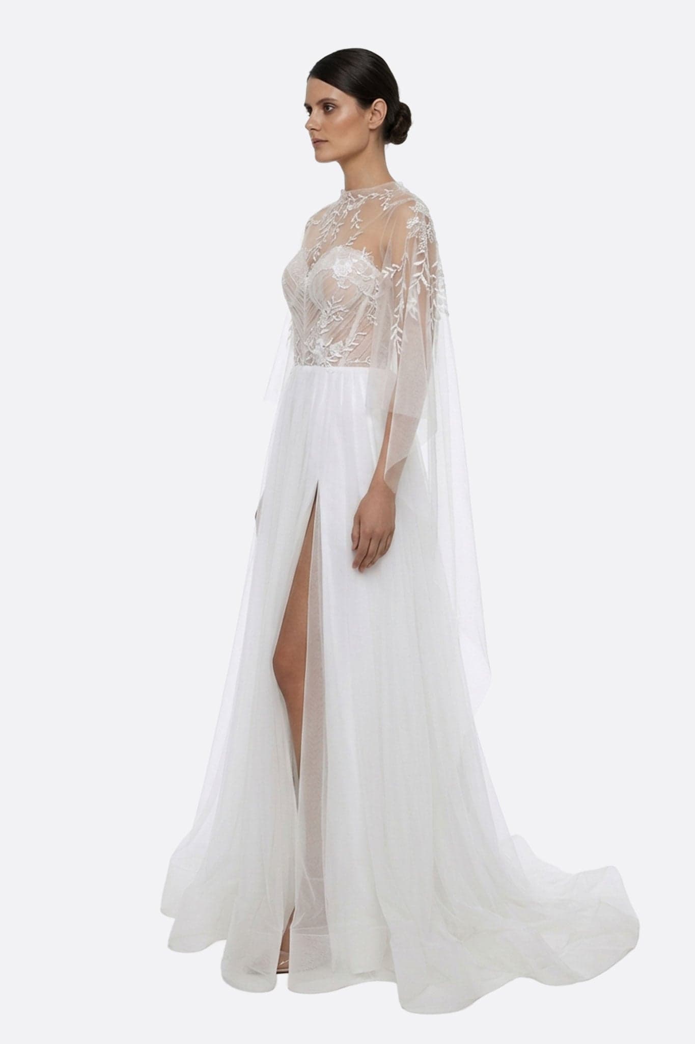 Close-up on the white tulle bustier of the Alena wedding dress, delicate overcoat adding a refined touch to your wedding.
